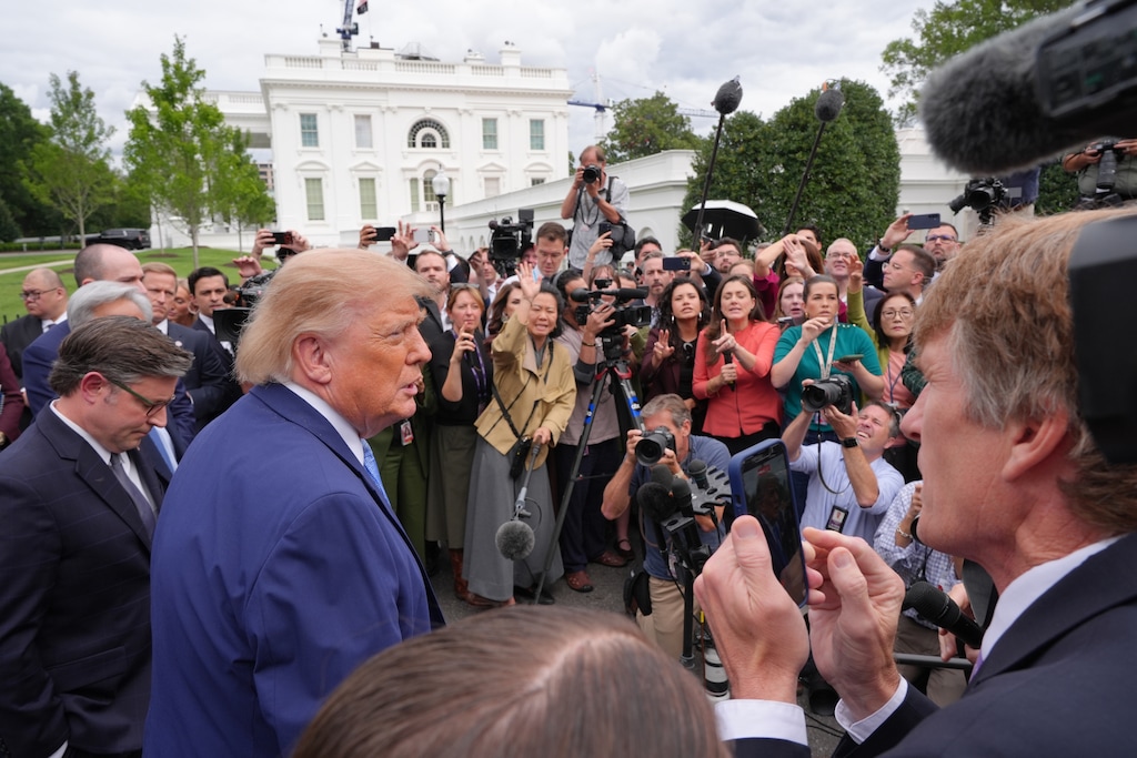 President Donald Trump speaks to reporters at the White House in Washington, Tuesday Sept. 29, 2026, after meeting with top executives of AI firms, as House Speaker Mike Johnson of La., listens at left. (AP Photo/Jacquelyn Martin)