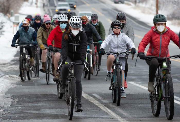 (Francisco Kjolseth  | The Salt Lake Tribune) People participate in a memorial bike ride along the East bench in Salt Lake City on Sunday, Feb. 14, 2021, in honor of the four who died in an avalanche on Saturday, Feb. 6.