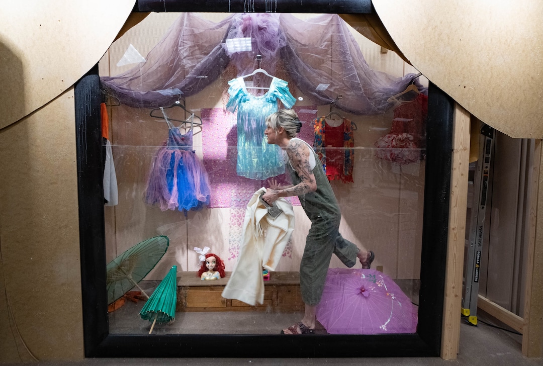 (Francisco Kjolseth | The Salt Lake Tribune) Artist Katia Racine works on a portion of the Happyton Returns section of Dreamscapes, an immersive experience created by artists that promotes sustainability and uses almost exclusively up cycling materials, begins to take shape in the old Macy's at South Town on Wednesday, April 20, 2022. 