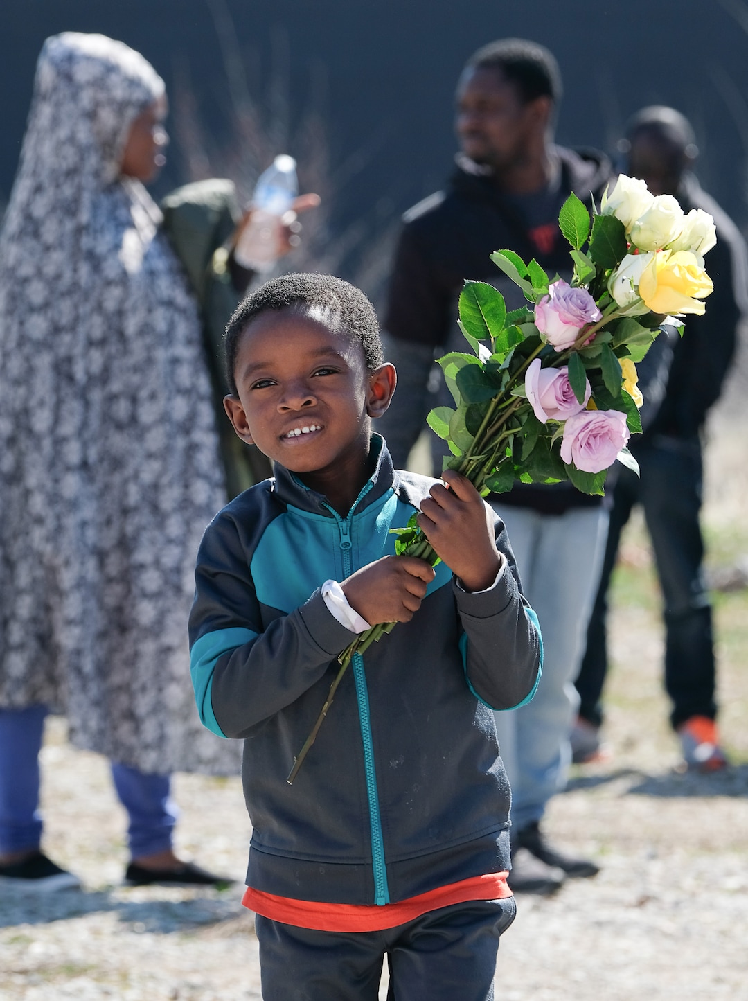 (Francisco Kjolseth  |  The Salt Lake Tribune)  Imad Iddrisu, 5, holds flowers recently received by people showing their love and support for the small community of members at the Al Sahaba Mosque in Orem who gathered following Friday prayers in solidarity following the tragic shootings in New Zealand. When asked by a family member why he received flowers he responded "because they love me." 