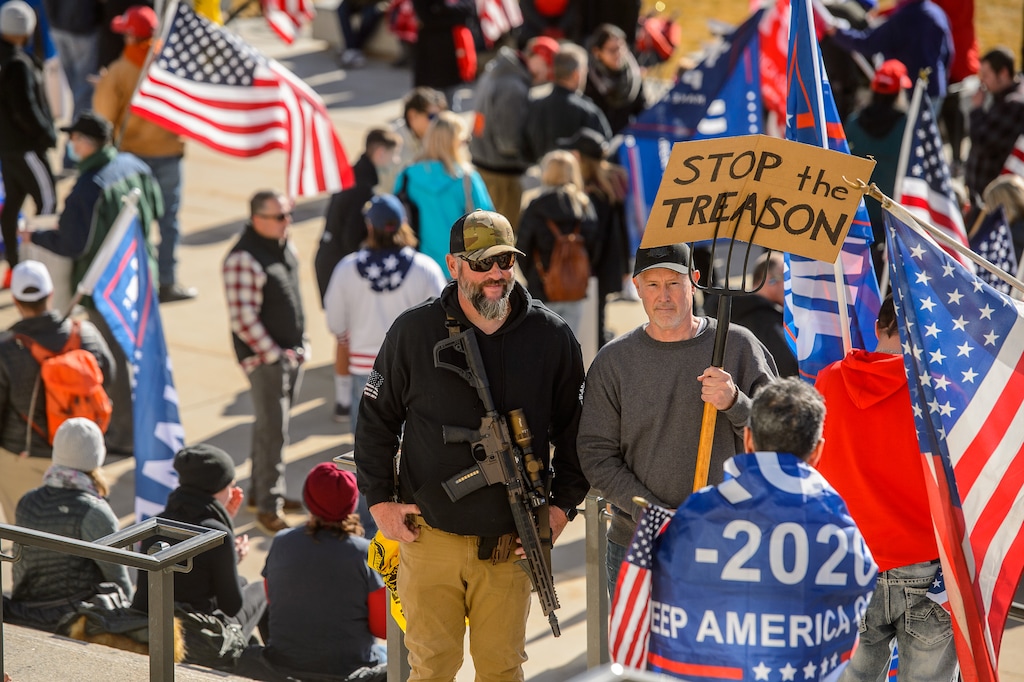 (Trent Nelson  |  The Salt Lake Tribune) A group of Trump supporters listens to speeches at the State Capitol in Salt Lake City on Wednesday, Jan. 6, 2021.