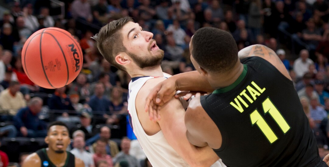(Leah Hogsten  | The Salt Lake Tribune)  Gonzaga Bulldogs forward Killian Tillie (33) and Baylor Bears guard Mark Vital (11) tangle up as they fight for the ball as Baylor faces Gonzaga in the second round of the NCAA tournament in Salt Lake City on Saturday, March 23, 2019.