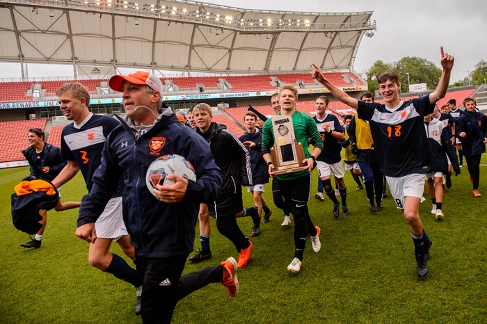 (Trent Nelson  |  The Salt Lake Tribune)  
Brighton players celebrate after defeating Olympus High School 3-2 in overtime in the 5A boys state championship game at Rio Tinto Stadium in Sandy, Thursday May 23, 2019.