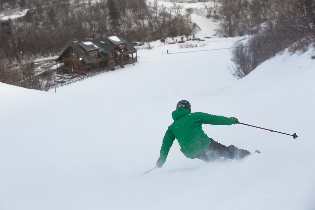(Cherry Peak) A skier enjoys a coating of powder while skiing at Cherry Peak Resort near Richmond on Feb. 24, 2022.