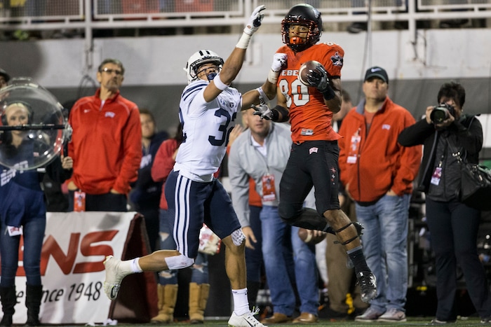 UNLV wide receiver Brandon Presley (80) makes a catch against BYU defensive back Chris Wilcox (32) during an NCAA college football game Friday, Nov. 10, 2017, in Las Vegas. (Erik Verduzco/Las Vegas Review-Journal via AP)