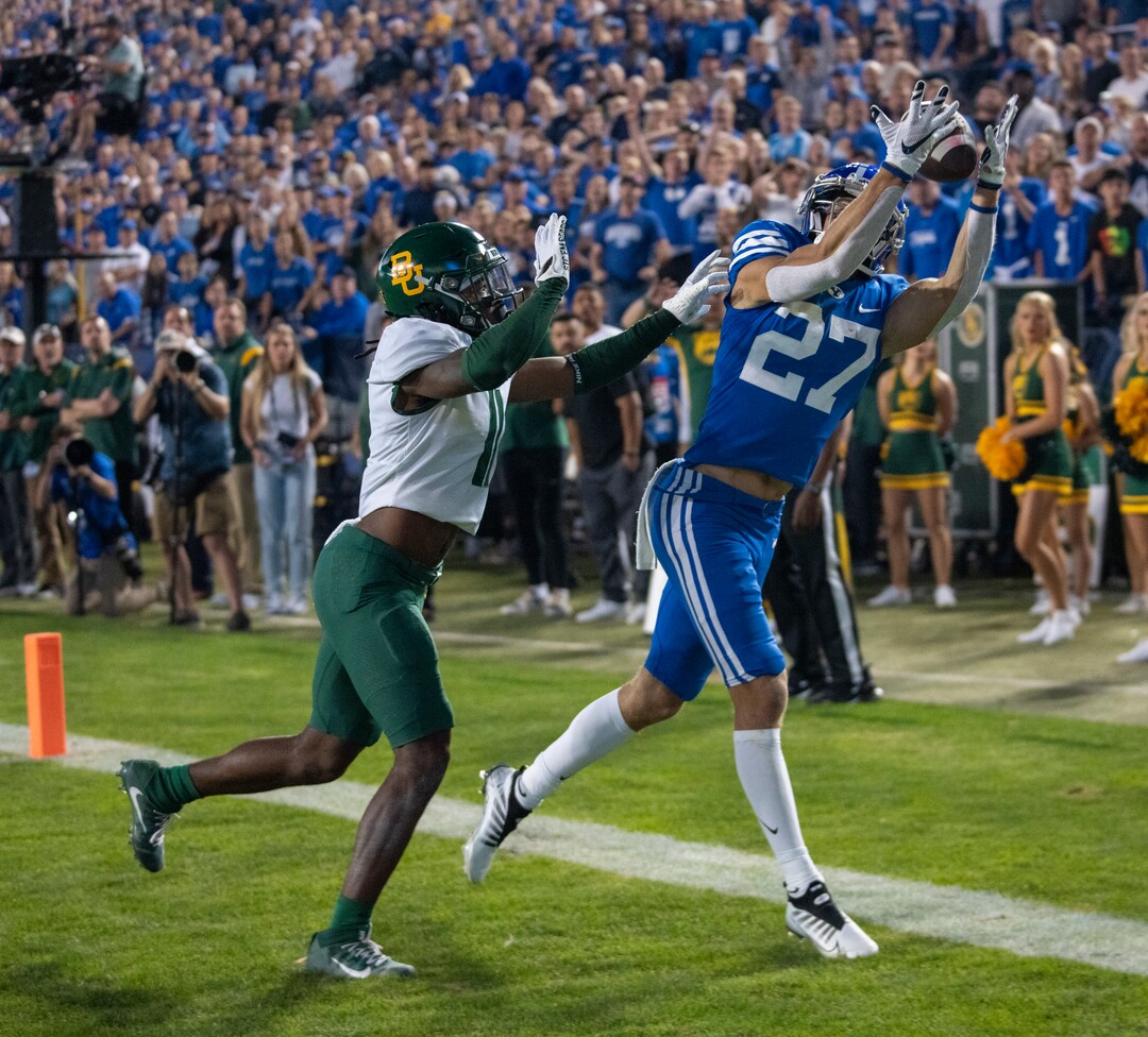 (Rick Egan | The Salt Lake Tribune)  Brigham Young wide receiver Chase Roberts (27) catches a pass in the end zone for the Cougars, as Baylor Bears cornerback Lorando Johnson (11) defends,  in football action between the Brigham Young Cougars and the Baylor Bears at Lavell Edwards Stadium in Provo, on Saturday, Sept. 10, 2022.
