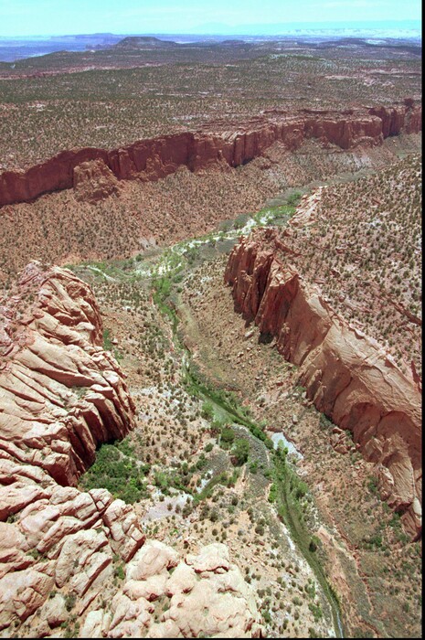 FILE - This May 30, 1997, file photo, shows the varied terrain of Grand Staircase-Escalante National Monument near Boulder, Utah. The window opened Friday, Feb. 2, 2018, for oil, gas, uranium and coal companies to make requests or stake claims to lands that were cut from two sprawling Utah national monuments by President Trump in December but there doesn't appear to be a rush to seize the opportunity. (AP Photo/Douglas C. Pizac, File)