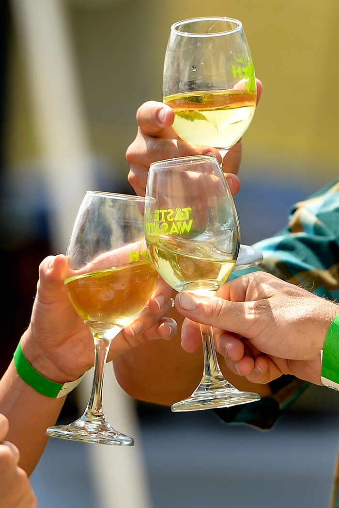 Leah Hogsten | The Salt Lake Tribune A toast is made during the annual Taste of the Wasatch food and wine event Sunday, August 5, 2018 at Solitude. Many attendees were conflicted after learning that tens of thousands of dollars in proceeds were funneled to the host organization and its leader instead of being donated to its non-profit charity, Utahns Against Hunger, but decided to attend anyway since no refunds would be given.