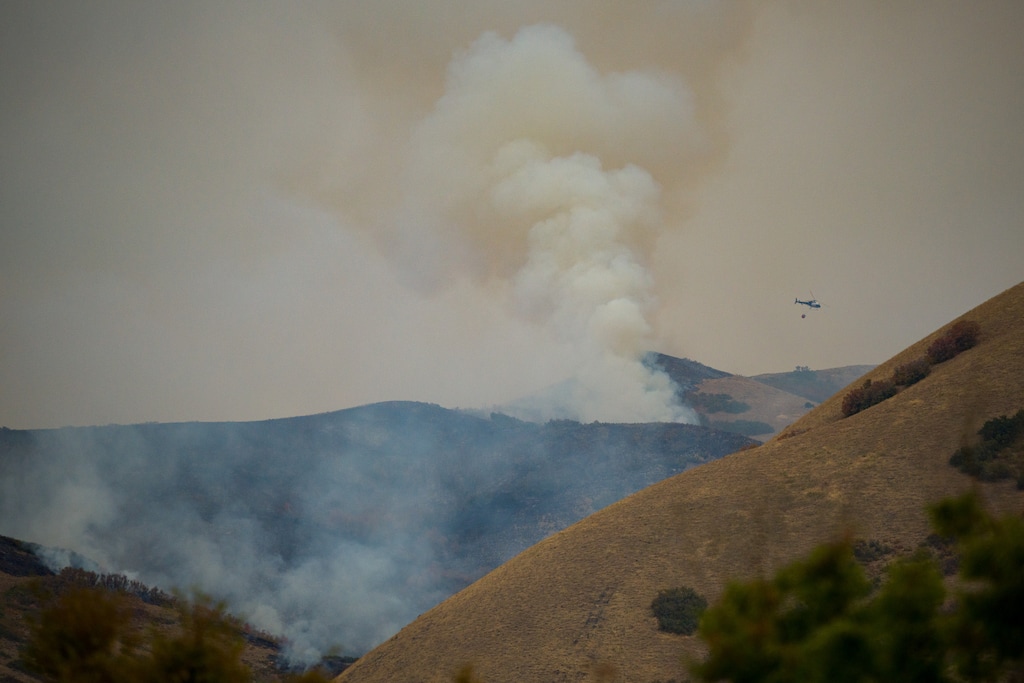 (Trent Nelson | The Salt Lake Tribune) The Deer Creek Fire burns above Salt Lake City on Tuesday, Sept. 30, 2025.