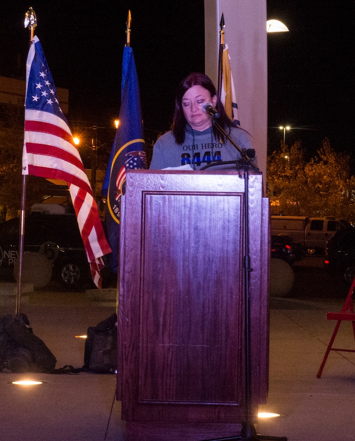 (Rick Egan  |  The Salt Lake Tribune)  Jenny Brotherson, mother of Cody Brotherson, wipes a tear as she speaks during a memorial ceremony at Fairbourne Station Plaza in West Valley City, in remembrance of her son Cody, who was killed in the line of duty one year ago today. It was announced tonight that West Valley will name 4100 South Cody Brotherson Parkway. Monday, November 6, 2017.