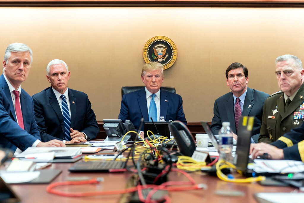 (Shealah Craighead | White House via AP) In this image released by the White House, President Donald Trump is joined by Vice President Mike Pence, second from left, national security adviser Robert O’Brien, left; Secretary of Defense Mark Esper, second from right, and Chairman of the Joint Chiefs of Staff Army Gen. Mark A. Milley, right, Saturday, Oct. 26, 2019, in the Situation Room of the White House monitoring developments in the U.S. Special Operations forces raid that took out Islamic State leader Abu Bakr al-Baghdadi.