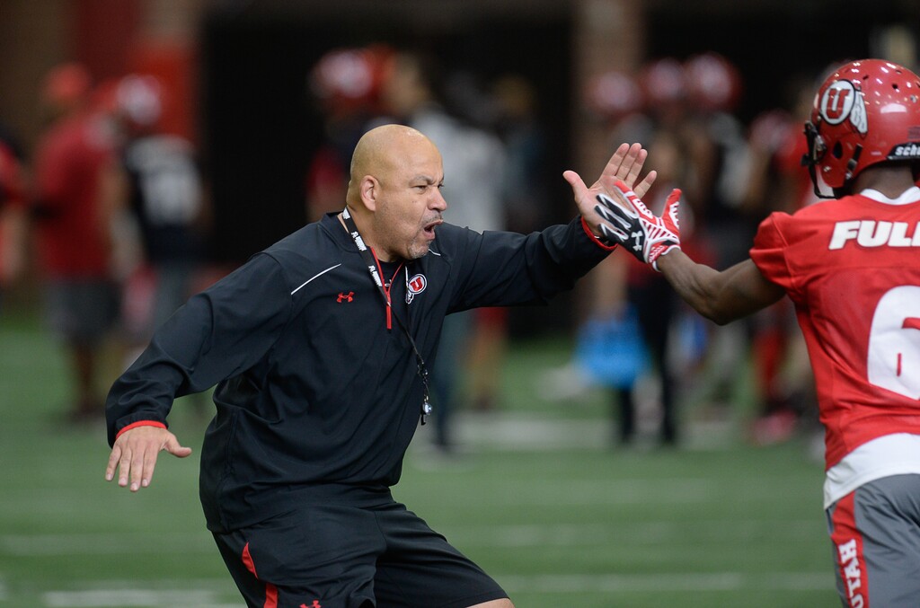 Francisco Kjolseth | The Salt Lake TribuneUniversity of Utah wide receiver coach Guy Holliday encourages his the team running drills as the team kicks off opening day of spring practice on Tuesday, March 22, 2016.