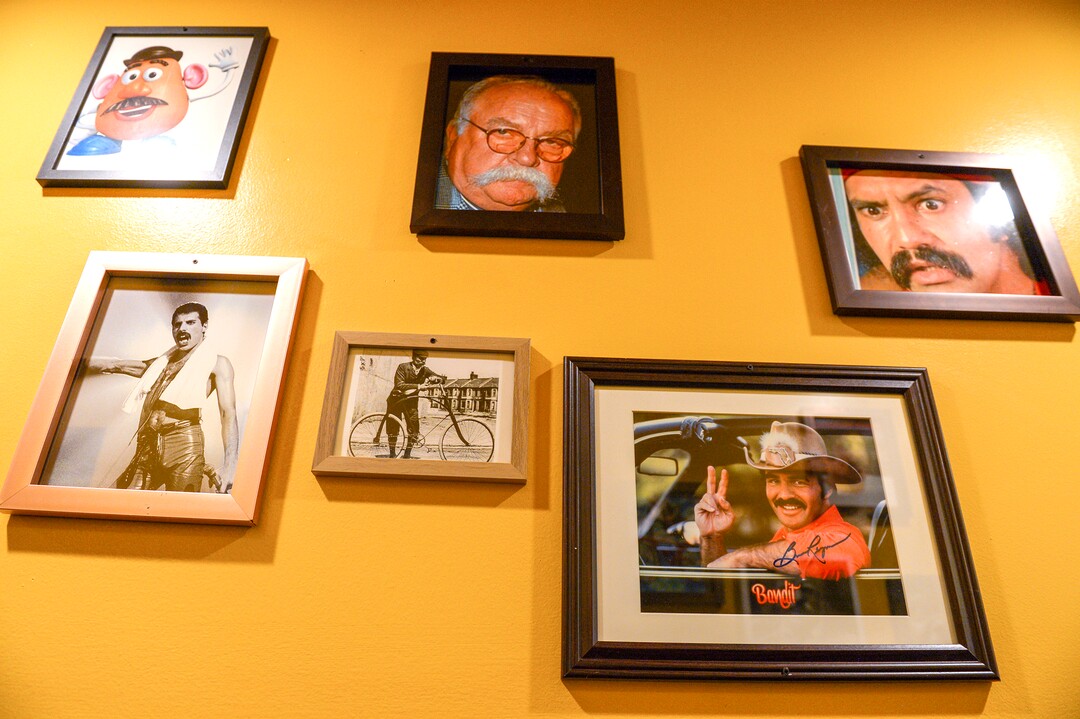 (Leah Hogsten  |  The Salt Lake Tribune) HandleBar, a new "biker" bar in Salt Lake City's Marmalade District, features iconic photos of famous mustached men, including Freddie Mercury, Utah's own Wilford Brimley, Cheech Marin and Bert Reynolds.