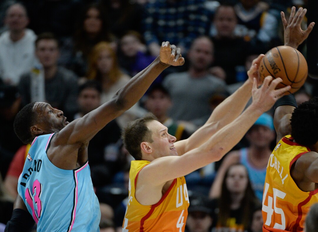 (Francisco Kjolseth  |  The Salt Lake Tribune) Miami Heat forward Bam Adebayo (13) battles Utah Jazz forward Bojan Bogdanovic (44) for a rebound as the Utah Jazz host the Miami Heat in their NBA basketball game at Vivint Smart Home Arena in Salt Lake City on Wednesday, Feb. 12, 2020.