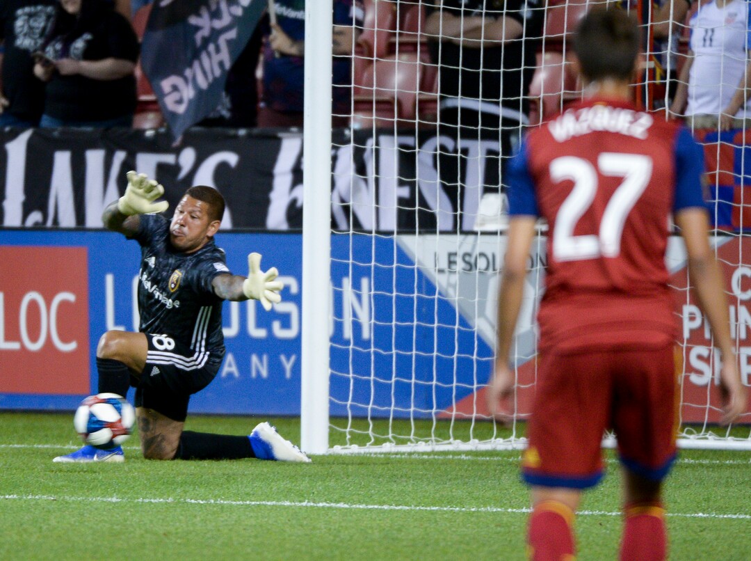 (Leah Hogsten  |  The Salt Lake Tribune) Los Angeles FC forward Adama DiomandeÕs (99) goal slips past Real Salt Lake goalkeeper Nick Rimando (18) as Real Salt Lake hosts Los Angeles Football Club in the fourth round of the Lamar Hunt U.S. Open Cup, June 11, 2019 at Rio Tinto Stadium in Sandy.