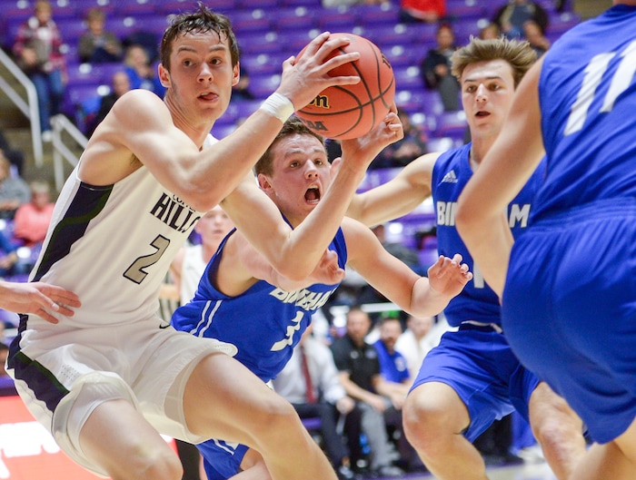 (Leah Hogsten  |  The Salt Lake Tribune) Copper Hills' Benjamin Bittner (02) is pressured by Bingham's defense. Copper Hills defeated Bingham 61-54 in the 6A High School Boys' Basketball Tournament opening game at Weber State University’s Dee Events Center in Ogden, Tuesday, Feb. 27, 2018. 