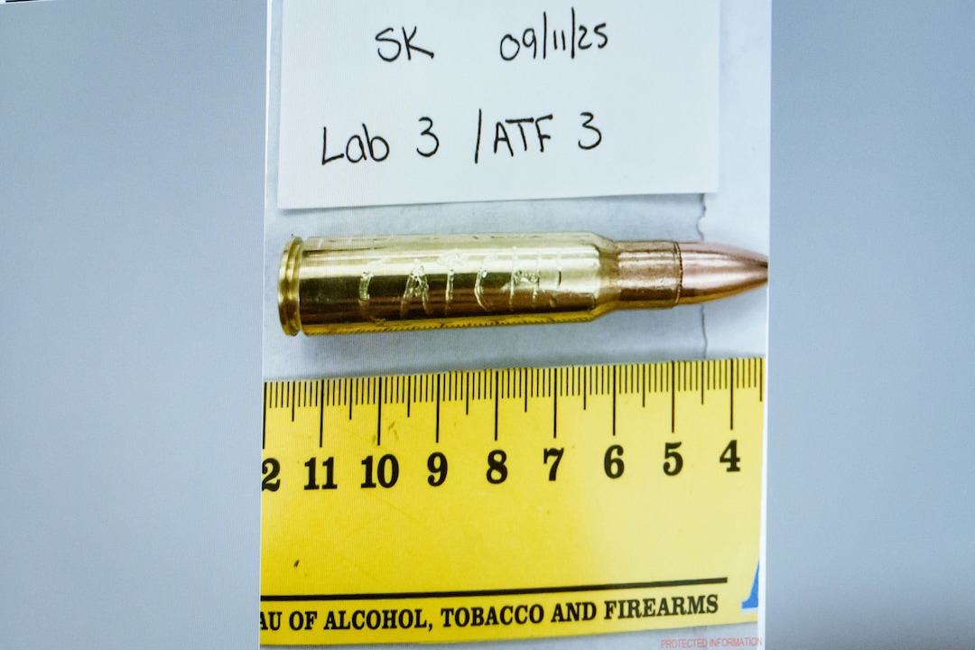 (Spenser Heaps | Pool) An image of a bullet casing engraved with the word “Catch!” is displayed during a preliminary hearing for Tyler Robinson, who is accused in the fatal shooting of Charlie Kirk, at the Fourth District Courthouse in Provo, Thursday, July 9, 2026.