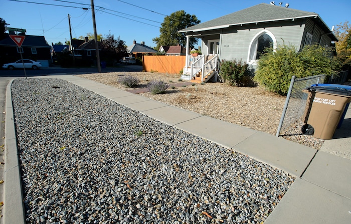 (Steve Griffin  |  The Salt Lake Tribune)  Mickey Campbell's Salt Lake City home, Thursday October 5, 2017, where he was told by the city his yard violated a law requiring at least 33% of front yard and park strip to be covered in vegetation. 
