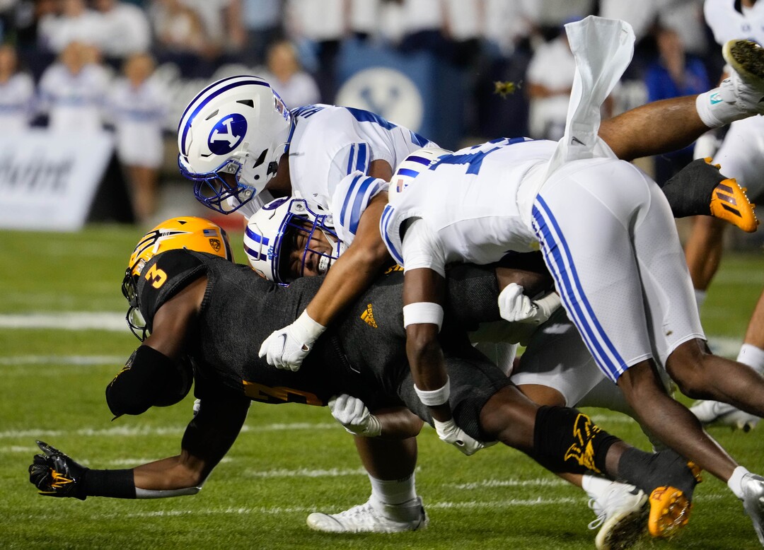 (Francisco Kjolseth | The Salt Lake Tribune) Arizona State Sun Devils running back Rachaad White (3) is taken down by BYU in football action between the Brigham Young Cougars and the Arizona State Sun Devils at LaVell Edwards Stadium in Provo, on Saturday, Sept. 18, 2021.