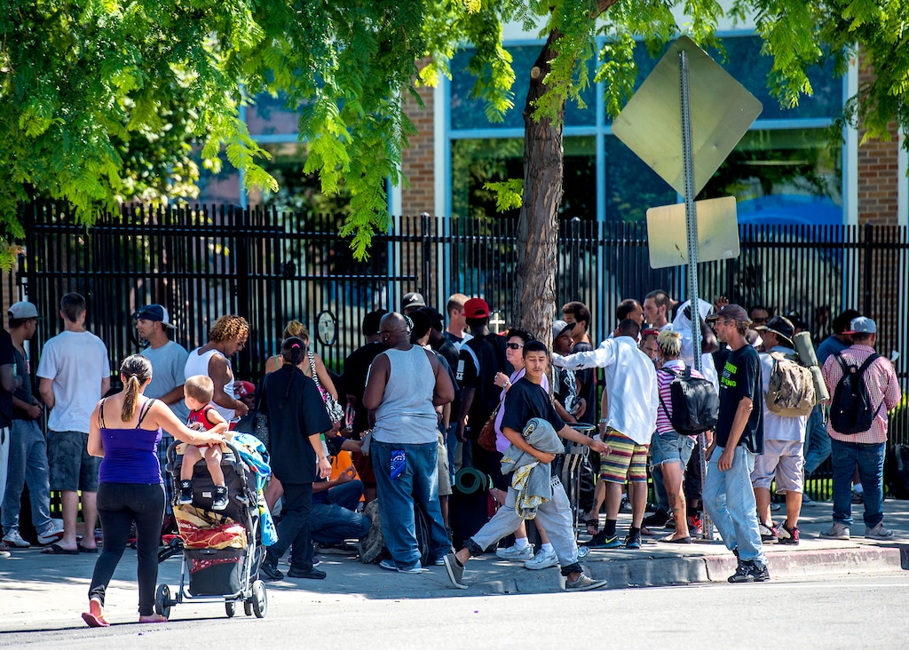 Chris Detrick  |  The Salt Lake TribuneHomeless men and women congregate outside the Bishop Weigand Homeless Day Center in Salt Lake City Tuesday August 4, 2015. 