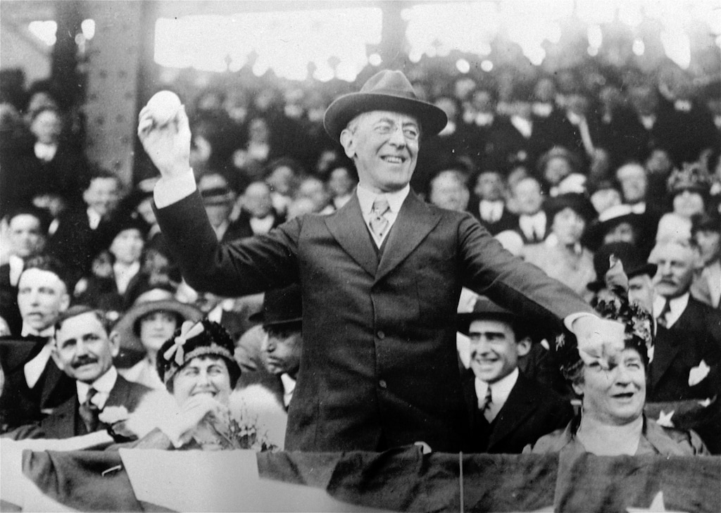 In this 1916 AP file photo, President Woodrow Wilson throws out the first ball at a baseball game in Washington.