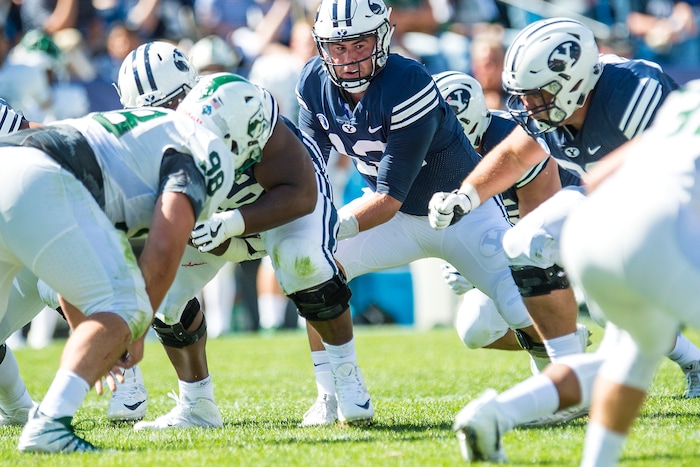 (Chris Detrick  |  The Salt Lake Tribune)  Brigham Young Cougars quarterback Tanner Mangum (12) during the game at LaVell Edwards Stadium Saturday, August 26, 2017.