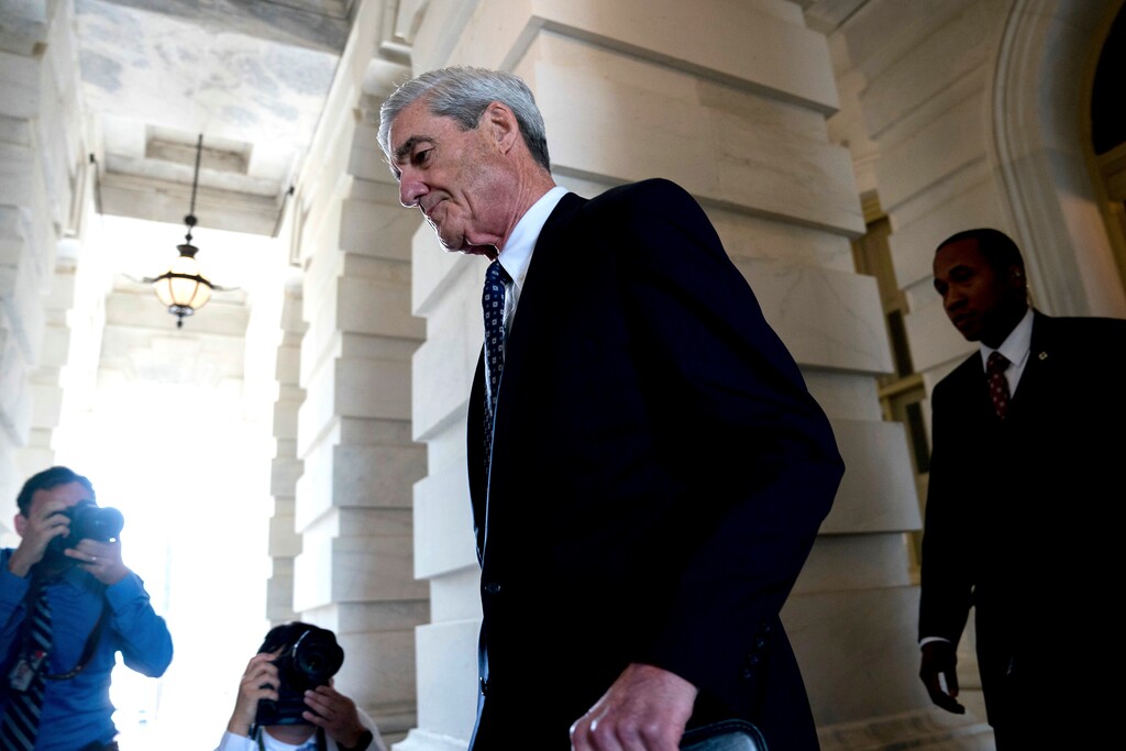 FILE - In this June 21, 2017, file photo, former FBI Director Robert Mueller, the special counsel probing Russian interference in the 2016 election, departs Capitol Hill after a closed-door meeting in Washington. While the country waits to see if President Donald Trump will sit for an interview with prosecutors, scores of people sucked into the investigation are waiting for their own signal from special counsel Mueller: whether he’s done with them or not.  (AP Photo/Andrew Harnik, File)