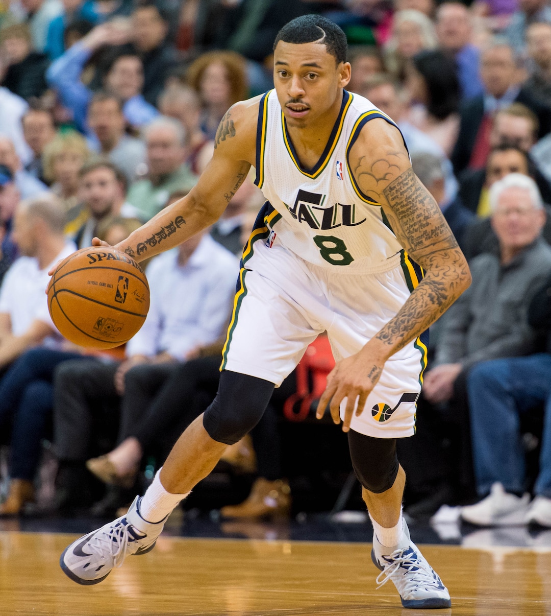 (Trent Nelson | Tribune file photo) Utah Jazz point guard Diante Garrett (8) controls the ball as the Jazz host the Phoenix Suns, in Salt Lake City, Wednesday, Feb. 26, 2014.