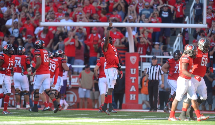Leah Hogsten  |  The Salt Lake Tribune
Utah Utes quarterback Troy Williams (3) celebrates Utah Utes tight end Evan Moeai's (18) touchdown. University of Washington Huskies defeated University of Utah Utes 31-24 at Rice-Eccles Stadium, Saturday, October 29, 2016.
