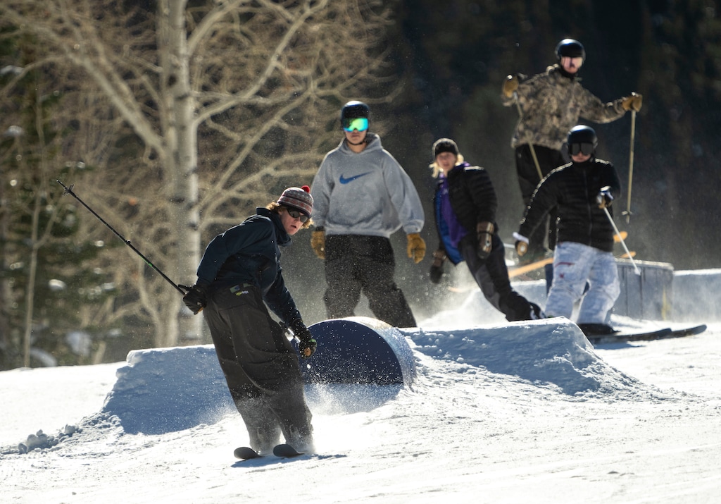 (Rick Egan | The Salt Lake Tribune) Skiers and snowboarders enjoy the terrain park on the Easy Street run during the opening day of ski and snowboard season at Solitude Mountain Resort on Friday, Nov. 8, 2024.