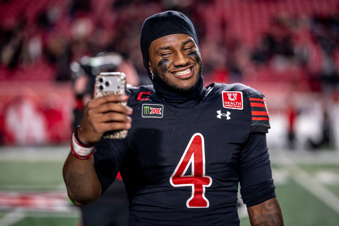 (Trent Nelson  |  The Salt Lake Tribune) Utah Utes quarterback Devon Dampier (4) films a social video after the win as Utah hosts Houston, NCAA football at Rice-Eccles Stadium in Salt Lake City on Saturday, Oct. 24, 2026.