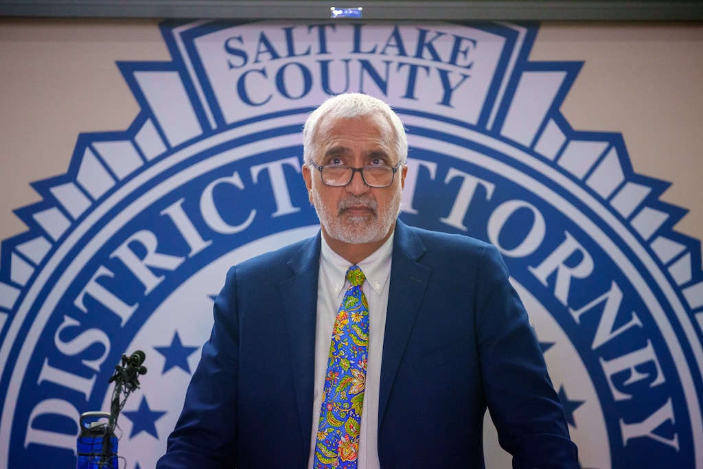 (Trent Nelson | The Salt Lake Tribune) Salt Lake County District Attorney Sim Gill watches a video of a fatal 2018 police shooting during a news conference in Salt Lake City on Friday, Aug. 26, 2022. Early returns show Democratic incumbent Sim Gill is leading in the race for Salt Lake County district attorney.