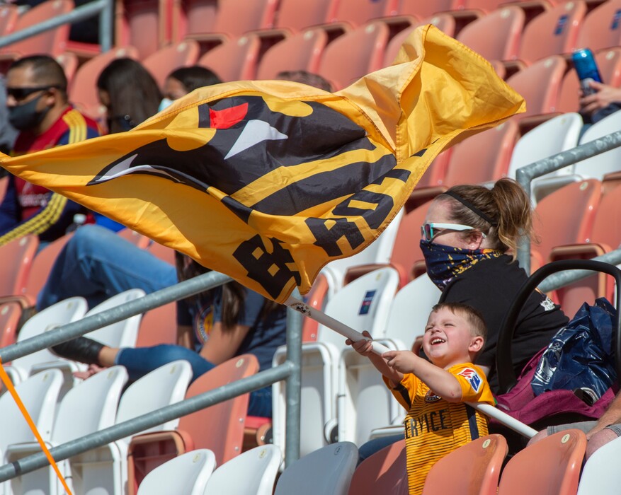(Rick Egan  |  The Salt Lake Tribune)  A little Utah Royals FC fan waves a big flag, during soccer action between Utah Royals FC and Ol Reign FC at Rio Tinto Stadium in Sandy, Saturday, Sept. 26, 2020.