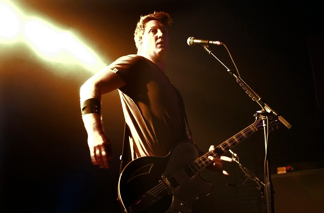 (Rick Egan  |  The Salt Lake Tribune)  Queens of the Stone Age singer/guitarist Josh Homme plays at In The Venue Monday, May 23, 2005.