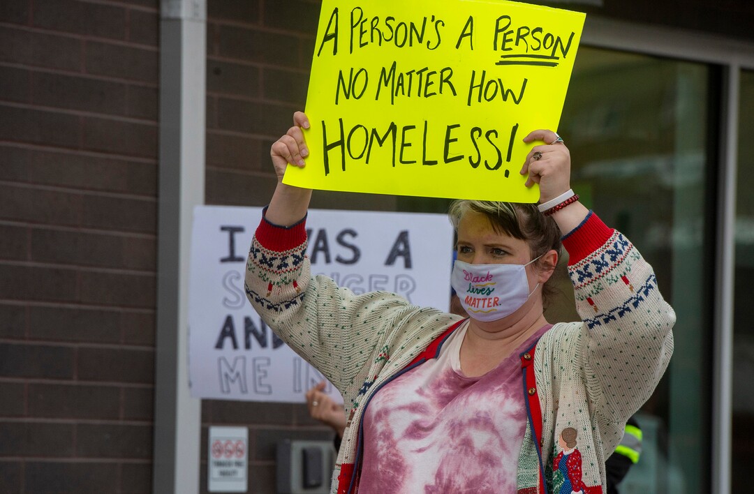 (Rick Egan | The Salt Lake Tribune) Jessica Newton  joins more than 100 Black Lives Matter and other groups protest the way the health department has been forcing people experiencing homelessness to move in the middle of a pandemic and the coldest time of the year, in front of the Salt Lake Public Health Center onFriday, Dec. 18, 2020.