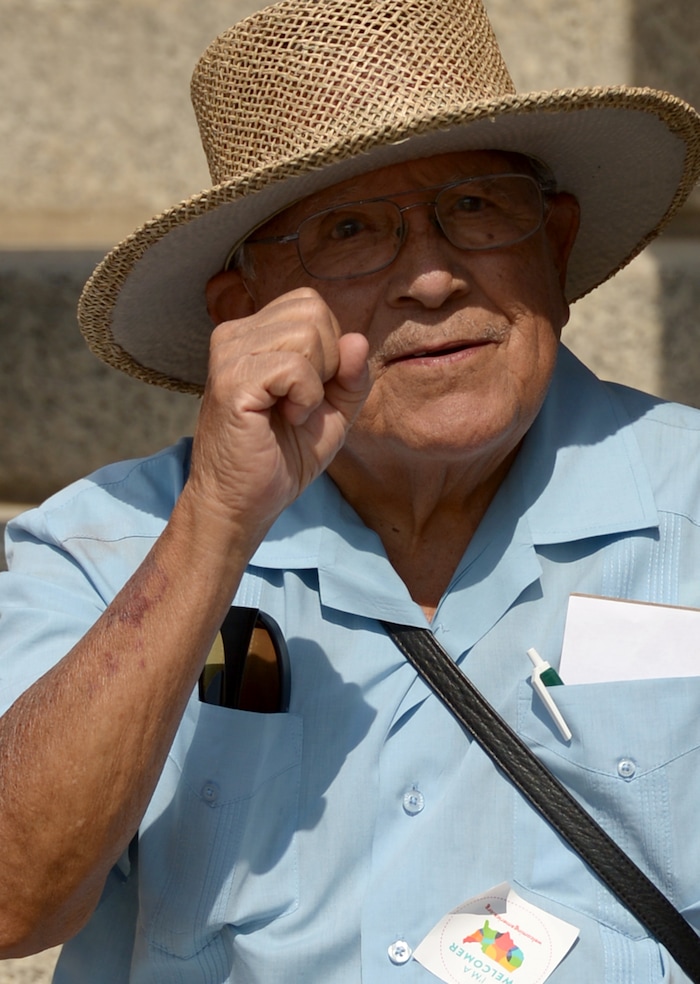 (Leah Hogsten  |  The Salt Lake Tribune) Activist Archie Archuleta chants "We Will Win" with the crowd. Hundreds of "We are Dreamers," a Utah pro-Deferred Action for Childhood Arrival (DACA) group, marched in solidarity from the Utah Federal Building to the State Capitol with undocumented immigrants who will be affected by the end of DACA.