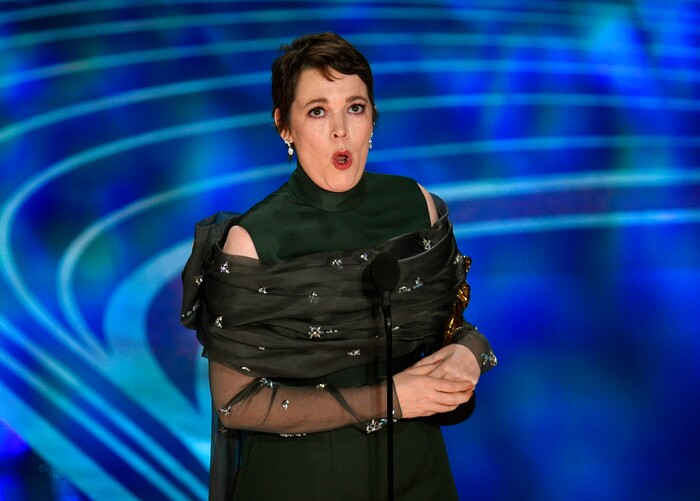 Olivia Colman accepts the award for best performance by an actress in a leading role for "The Favourite" at the Oscars on Sunday, Feb. 24, 2019, at the Dolby Theatre in Los Angeles. (Photo by Chris Pizzello/Invision/AP)