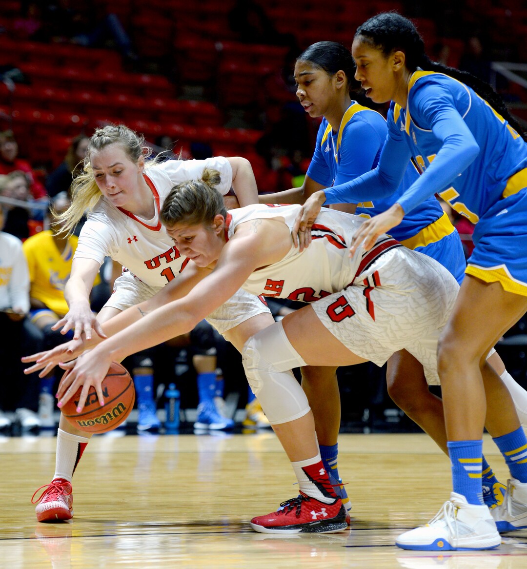 Steve Griffin  |  The Salt Lake TribuneUtah Utes guard Paige Crozon (14) and Utah Utes forward Emily Potter (12) stretch for the ball in front of UCLA's Kelli Hayes and Monique Billings during women's basketball game at the Huntsman Center in Salt Lake City, Sunday, January 31, 2016. 