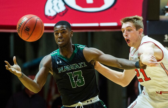 (Rick Egan  |  The Salt Lake Tribune)  Utah Utes forward Tyler Rawson (21) knocks the ball out of the hands of Hawaii Warriors forward Michael Thomas (13), in basketball action, Utah Utes vs Hawaii Warriors, at the Jon M. Huntsman Center, Saturday, December 2, 2017.