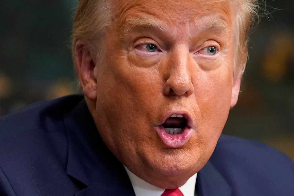 (Patrick Semansky | The Associated Press) President Donald Trump speaks with reporters after participating in a video teleconference call with members of the military on Thanksgiving, Thursday, Nov. 26, 2020, at the White House in Washington.