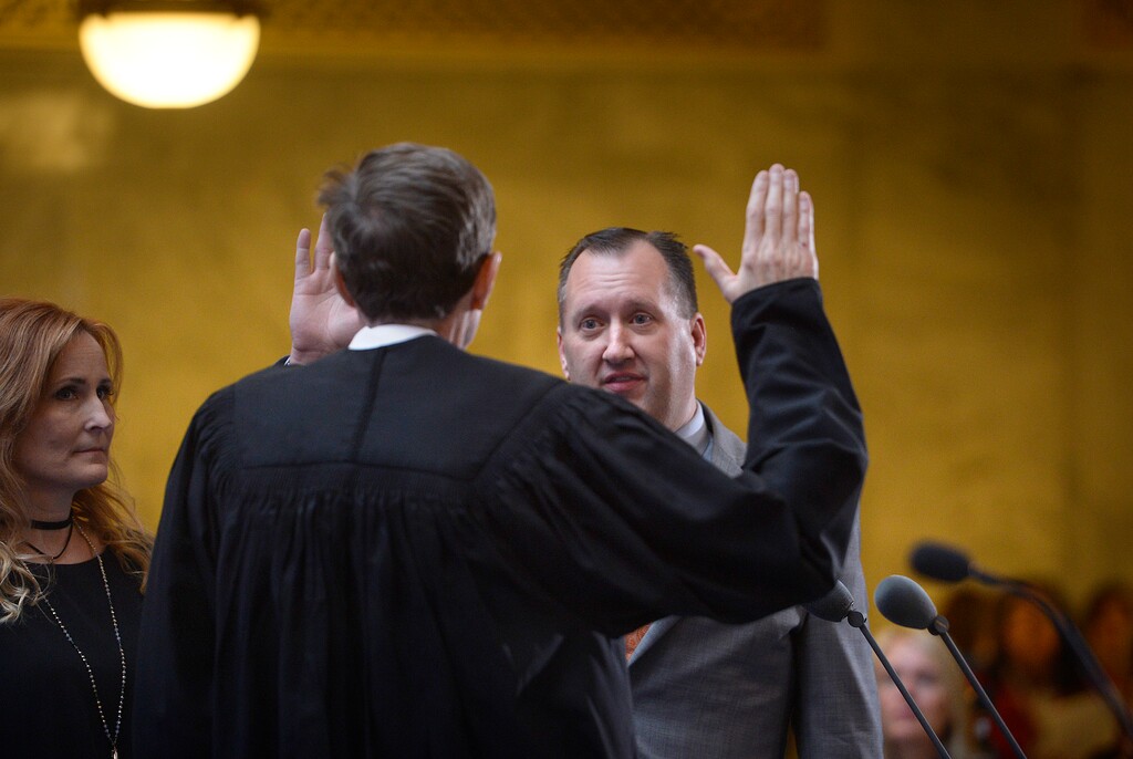 (Scott Sommerdorf   |  Tribune file photo)  Utah Auditor John Dougall takes his oath of office during the State of Utah's Inaugural Ceremony in the Capitol rotunda, Wednesday, Jan. 4, 2017.
