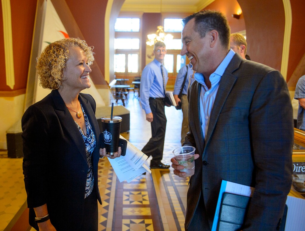 (Steve Griffin | The Salt Lake Tribune) Salt Lake City Mayor Jackie Biskupski and House Speaker Greg Hughes talk in the hall after shaking hands following the afternoon City Council meeting at the City and County Building in Salt Lake City Tuesday August 29, 2017. The government leaders called each other out on the airwaves Tuesday morning where Hughes said the mayor was trying to subvert aspects of Operation Rio Grande by spreading false information and in other ways resisting the effort. Biskupski countered that Hughes was trying to rush through changes without process, legal authority or a strategic plan.