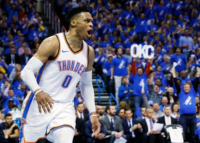 Oklahoma City Thunder guard Russell Westbrook (0) shouts after a dunk in the first half of Game 1 of an NBA basketball first-round playoff series against the Utah Jazz in Oklahoma City, Sunday, April 15, 2018. (AP Photo/Sue Ogrocki)