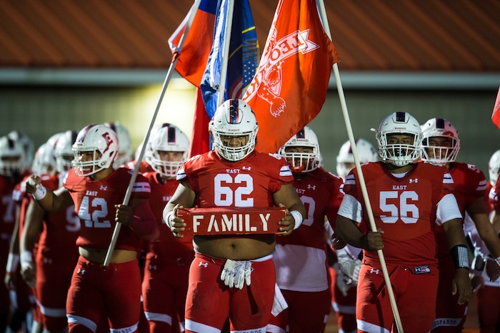 (Chris Detrick  |  The Salt Lake Tribune)  East's Apu Ika (62)  and his teammates walk onto the field before the game at East High School Friday, October 20, 2017. 