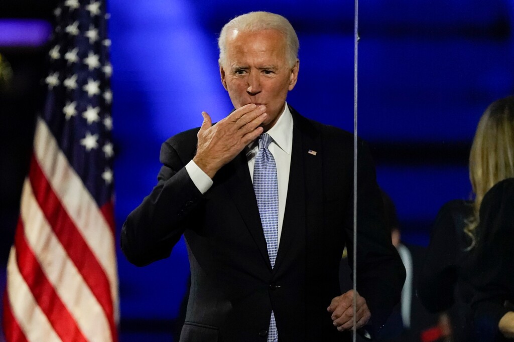 President-elect Joe Biden speaks blows a kiss to supporters Saturday, Nov. 7, 2020, in Wilmington, Del. (AP Photo/Andrew Harnik)