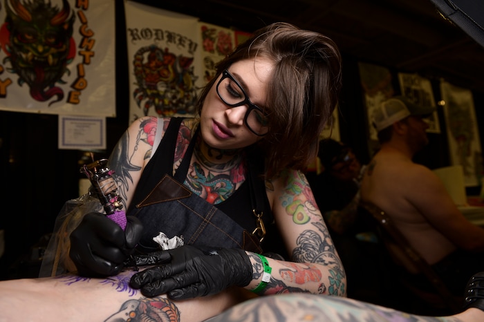 (Leah Hogsten | The Salt Lake Tribune) Tattoo artist Emily Rodkey with High Tide in Juneau, AK said she is already booked for the weekend with some "pretty good sized pieces" at the Salt Lake City International Tattoo Convention, Saturday, March 17, 2018.