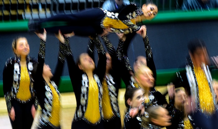 (Steve Griffin | The Salt Lake Tribune) Juan Diego's Drill Team performs during halftime of the 4A basketball playoff game against Hurricane at the Utah Valley UniversityÕs UCCU Center in Provo Thursday March 1, 2018.