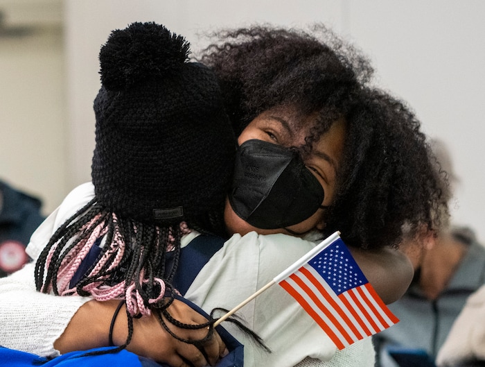 (Rick Egan | The Salt Lake Tribune) Short track speedskater Maame Biney, left, is greeted by her childhood best friend, Tori Fauntroy, as she arrives home in Salt Lake City, on Monday, Feb. 21, 2022. Biney and Fauntroy had not seen each other in 4 years.