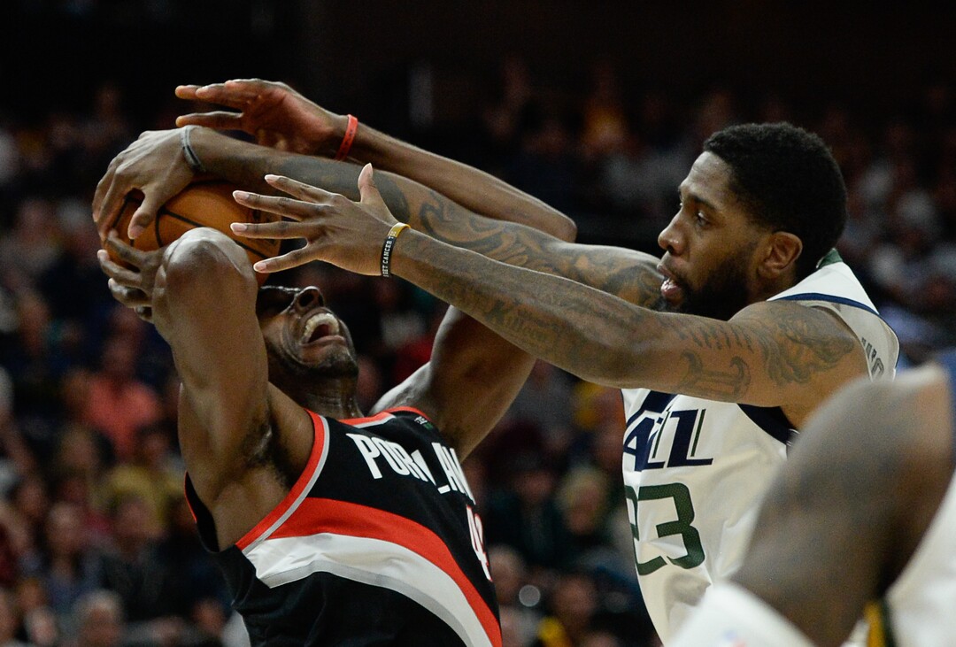 (Francisco Kjolseth  |  The Salt Lake Tribune)  Portland Trail Blazers forward Anthony Tolliver (43) is pressured by Utah Jazz forward Royce O'Neale (23) as the Utah Jazz host the Portland Trailblazers in their NBA basketball game at Vivint Smart Home Arena in Salt Lake City on Wed. Oct. 16, 2019.