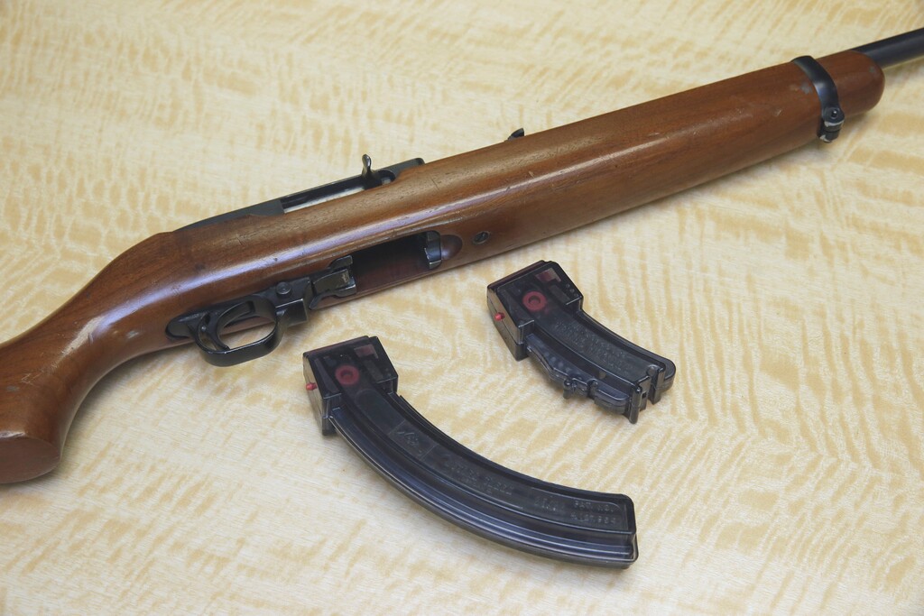 FILE -- In this June 27, 2017 photo, a semi-automatic rifle is displayed with a 25 shot magazine, left, and a 10 shot magazine, right, at a gun store in Elk Grove, Calif. (AP Photo/Rich Pedroncelli, File)